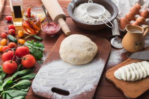 Ingredientes usados para fazer uma pizza em casa